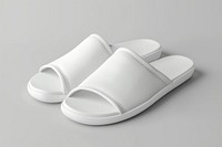 Slipper shoe footwear white flip-flops.