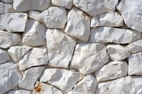 White rock wall texture backgrounds rubble architecture.