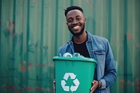 Man holding recycle bin smile adult green.