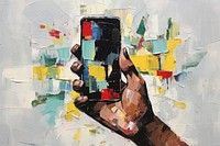 Hand holding smart phone painting collage photographing.