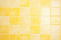 Pastel yellow tiles wall architecture backgrounds pattern.