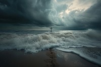 A powerful image of a stormy beach with dark clouds outdoors nature ocean.
