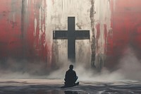 Man praying in front of a cross outdoors symbol adult.