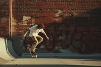 Skateboard footwear brick wall.