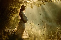 Pregnant woman photography sunlight portrait.