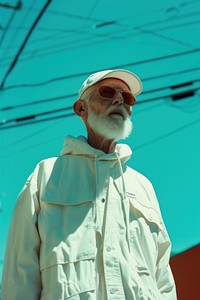 Old man wearing white streetwear clothes adult architecture portrait.