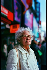 Old woman wearing white streetwear clothes portrait glasses adult.