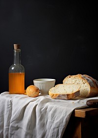 Bread and a bottle of honey food refreshment ingredient.