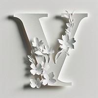 Letter V font flower white paper.
