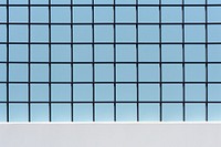 A black grid fence architecture pattern window.