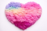 Heart shape pom pom rug white background creativity softness.