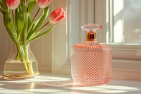 Perfume bottle pink container.