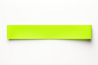 Piece of neon-green paper adhesive strip backgrounds text white background.