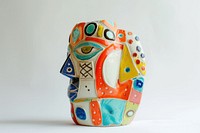 One piece of colorful ceramic art made by kid porcelain vase representation.