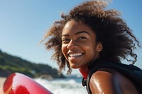 Black girl surfer surfing portrait smiling smile.