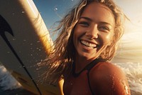 British girl surfer surfing recreation laughing portrait.