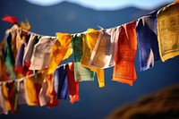 Tibetan prayer flags clothesline clothespin tradition.