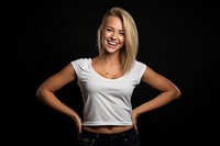 Blonde woman in a white t-shirt laughing portrait smiling.