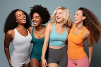Group of young women laughing friendship adult togetherness.
