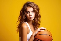Glad teen basketball girl with ball portrait sports yellow.