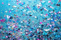 Light blue confetti backgrounds glitter.