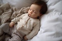 Newborn baby sleeping blanket bed comfortable.