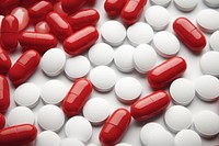 Pill capsules backgrounds red antioxidant.