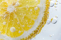 Lemon halved fruits oil bubble backgrounds plant food.