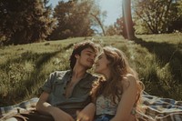 Couple of happy young adult picnic photography outdoors portrait.