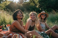 Group of happy young american adult picnic laughing sun togetherness.