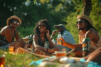 Group of happy young black adult picnic sunglasses outdoors fun.