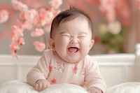 Happy asian baby girl beginnings relaxation innocence.