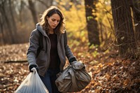 Environmental activist picking up garbage autumn adult accessories.