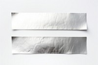Foil teature adhesive strip paper white background rectangle.