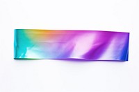 Rainbow foil teature adhesive strip purple white background turquoise.