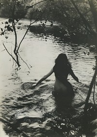 Woman go on an adventure swim surrounded by water swimming outdoors nature.