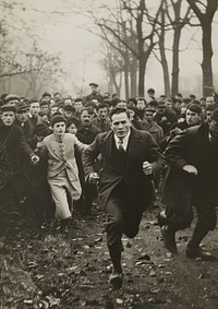 Man running surrounded by people outdoors sports adult.