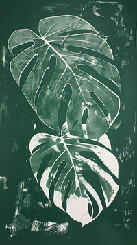 Silkscreen on paper of a monstera plant green leaf.