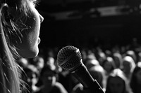 Speaking microphone audience adult.