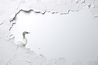 Torn strip of duck paper white backgrounds bird.