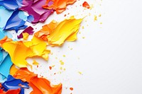 Torn strip of vibrant paper backgrounds petal white background.
