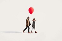 Couple walking with a balloon footwear adult togetherness.