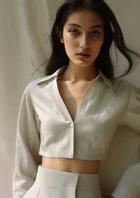 Cropped shirt with long sleeves blouse contemplation front view.