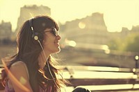 Young happy female photography headphones listening.