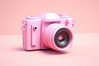 Pink camera photographing electronics technology.