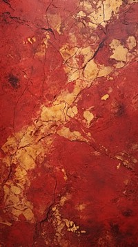 Crimson-gold rough paint wall.