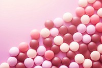 Cute flat icon of assorted chocolate candy gradient background backgrounds pill pink.