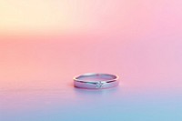 Wedding ring in gradient background jewelry pink celebration.