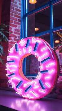Donut neon sign wallpaper light illuminated celebration.