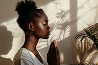 Woman doing praying pose adult contemplation spirituality.